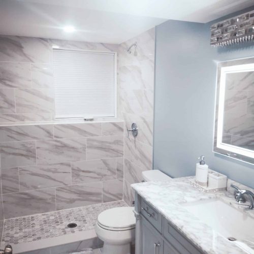 modern Edge Contracting tile and vanity Bathroom
